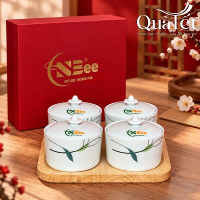 Alternative view of Bộ 4 hũ mứt sứ quà tặng Tết dáng tròn vẽ cành trúc QT-KM09